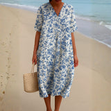 Lola - Vestido de Marfil Adornado con Acentos Florales en Azul Porcelana