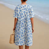 Lola - Vestido de Marfil Adornado con Acentos Florales en Azul Porcelana
