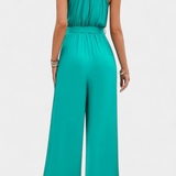 Nyree Asymmetrical Mono with Cut-Out and Bow Sleeve